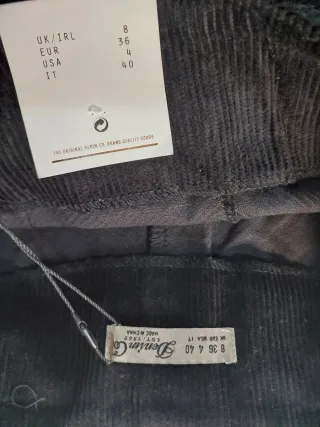 Minifalda pana negra talle 36