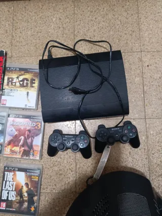 Consola PlayStation 3 + Volante y Juegos