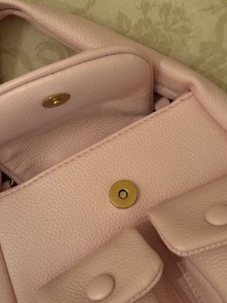 Borsa rosa con tasche