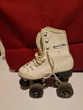 Patines de 4 ruedas número 32.