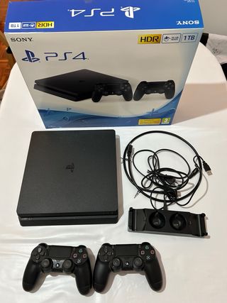 PS4 Slim 1TB con Caja, 2 Mandos y 8 juegos.