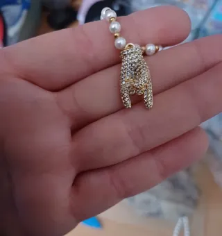 Braccialetto perline e ciondolo mano strass