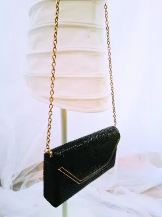 Bolso fiesta clutch cadena negro dorado