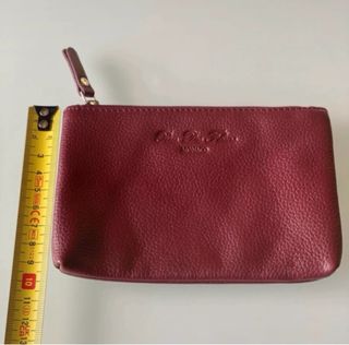 Portafoglio/ Pochette bordeaux.