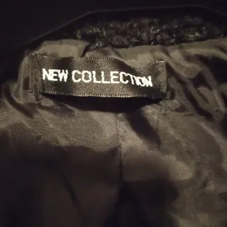 Cappotto nero tessuto bouclé