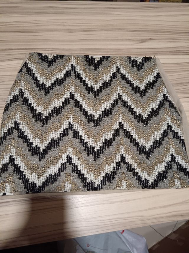 Pantalones Zara Estampados Talla XS
Faldas
Tops