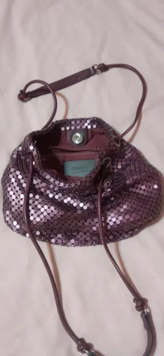 Bolso metalizado Abbacino burdeos