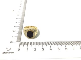 sello oro 18k con piedra