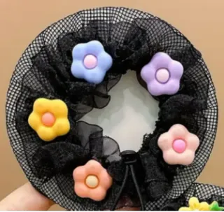 2 Recogedores de moño ajustable, Nuevos.