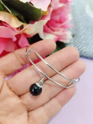 Bracciale rigido acciaio con su Coccu nero