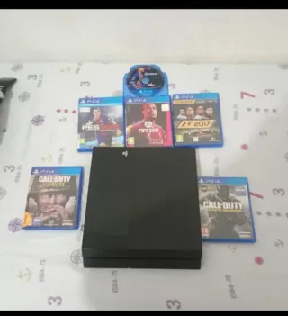 PS4 Negra + 2 Mandos + 6 Videojuegos