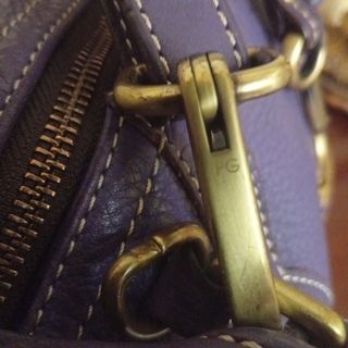 Bolso Purificación García morado piel con bandoler