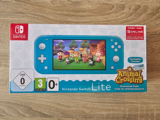 Nintendo Switch Lite Azul con varios juegos