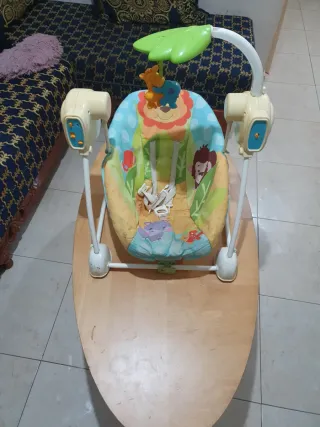 Columpio de bebé con música