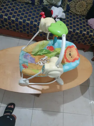 Columpio de bebé con música