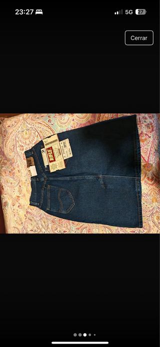 Falda vaquera azul
equivalente a cintura 37-38