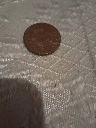 Moneda antigua coleccionable