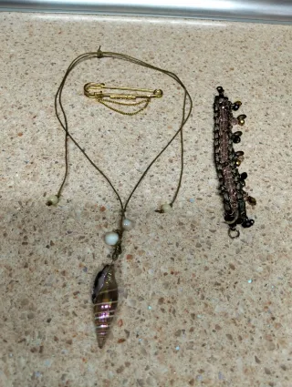 Conjunto de joyas con concha natural 