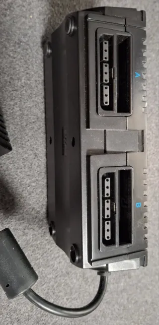Adaptador Multi-Jugador Joytech PS2