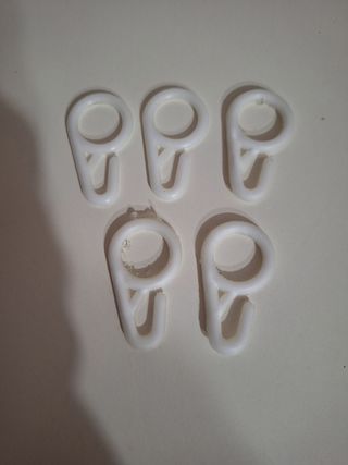 Ganci per tende in plastica bianca