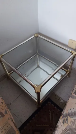 Mesa de centro cristal y metal dorado