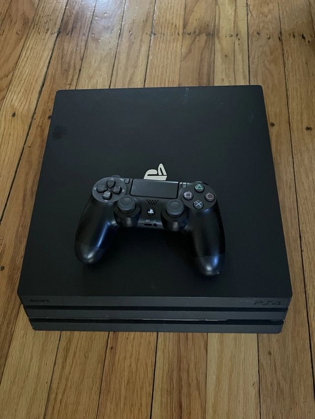 Ps4 Pro 1Tb Negra y mando
