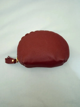 Bolso de cuero burdeos con cremallera dorada