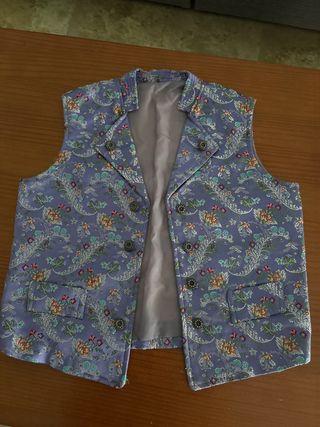 Chaleco fallero morado estampado
talla 8/10 años