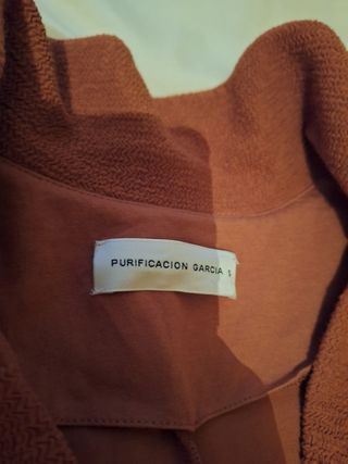 Conjunto punto Purificación García naranja