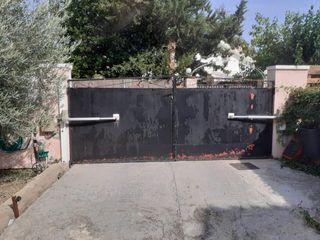 Puertas hierro garaje y entrada peatonal