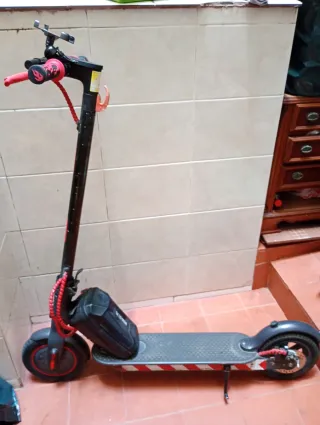 Patinete Xiaomi con batería externa