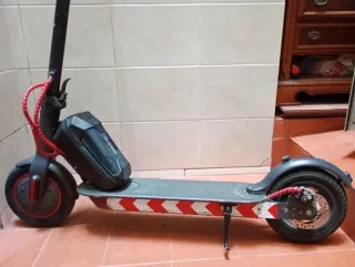 Patinete Xiaomi con batería externa
