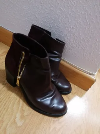 Botines de tacón muy usados