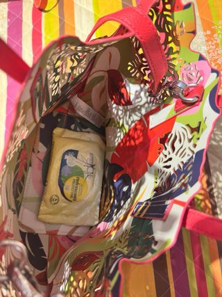 Borsa Carpisa rossa con dettagli traforati