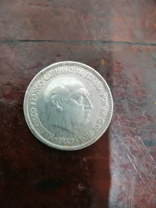 Moneda 25 Pts