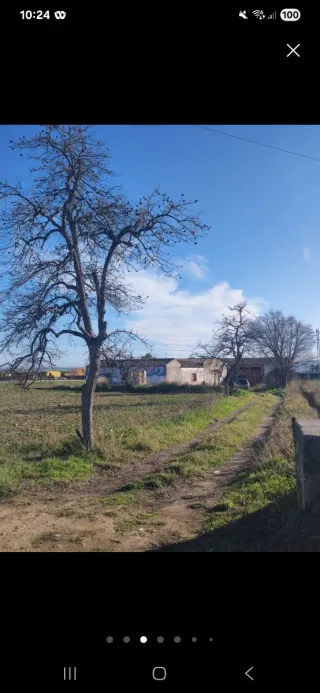 Terreno 19.445 m² con casa y naves en Andújar