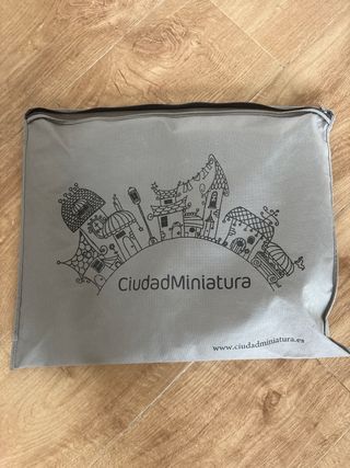 Saco de invierno muy calentito de ciudad miniatura