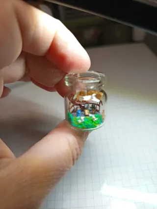 Presepe in miniatura in vasetto di vetro