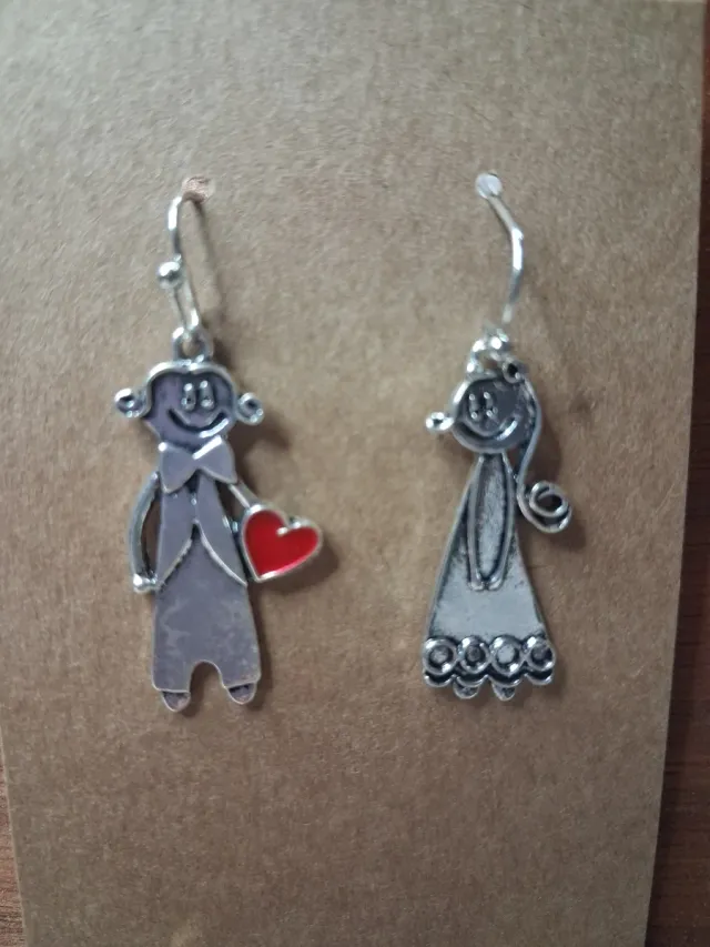 Pendientes pareja corazón plateados