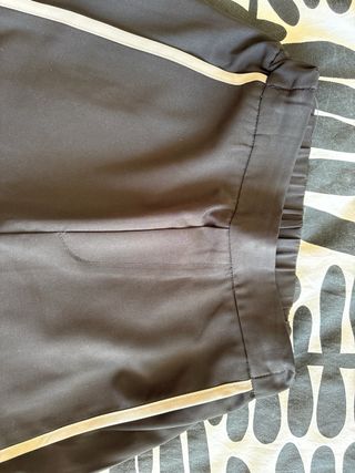 Pantalones negros mujer con raya lateral