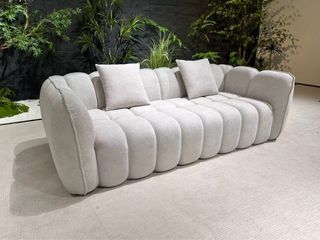 Sofá de tela de compresión amarilla