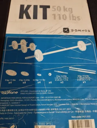 Kit Mancuernas 50k 
Domyos con Estuche