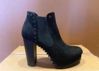 Botines nuevo ante negros