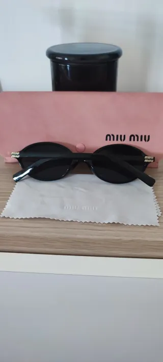 Óculos de Sol Miu Miu Pretos