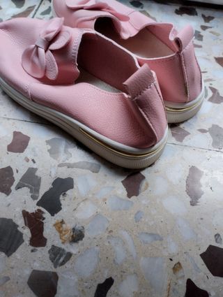 Zapatillas niña lazo rosa