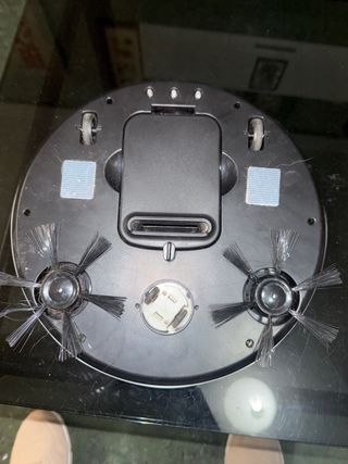 Robot aspirador blanco