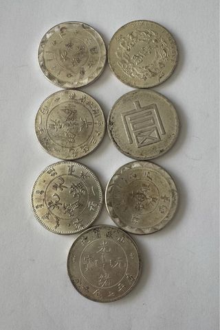 Lote 7 monedas chinas 
Chapadas en plata