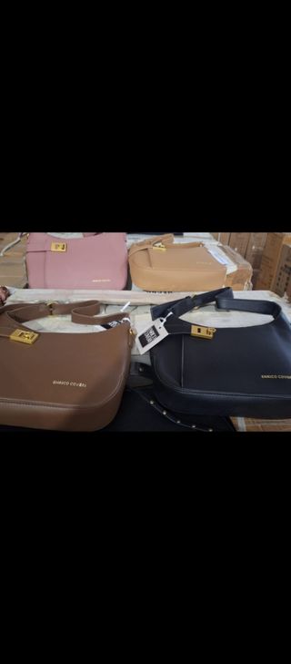 Bolso Enrico Coveri varios modelos y colores.