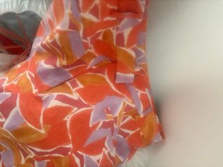 Lote de Ropa Variada: bañadores, faldas, vestidos.