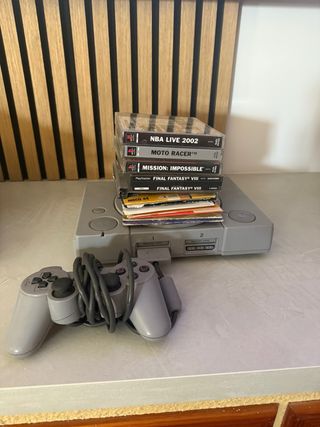 Consola PlayStation 1 con juegos